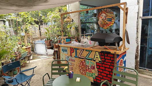 Pizza served at a stand in the family garden